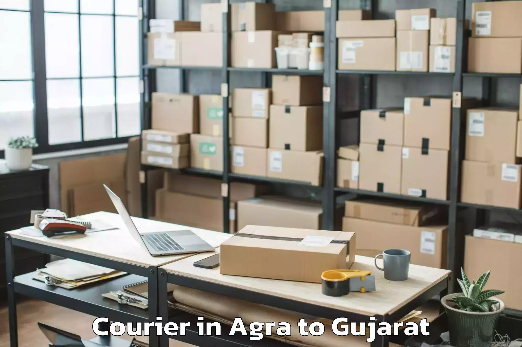 Leading Agra to Delvada Courier Provider